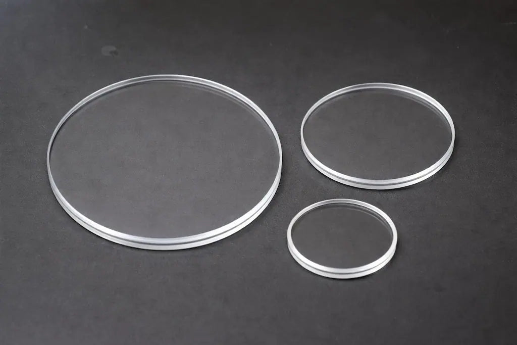 Clear round sight glass discs in multiple diameters for industrial tank, gearbox and pipeline viewing ports, precision-machined by Kaybin for process equipment.