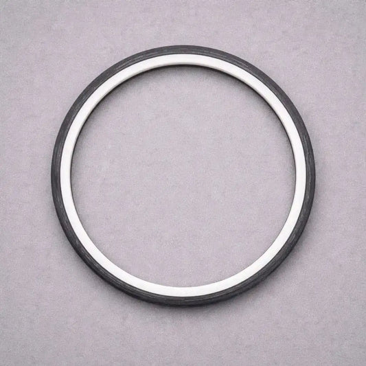 Composite piston seal with PTFE inner ring and rubber energiser for hydraulic cylinder pressure sealing