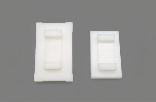 Custom plastic plunger blocks and dosing pistons machined by Kaybin for filling machines, metering pumps and packaging equipment in South Africa.
