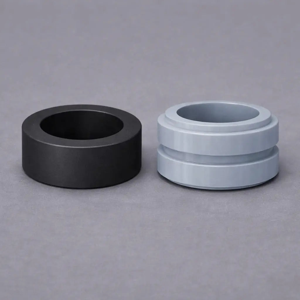 Bonded rubber-to-metal industrial bush with inner sleeve for vibration isolation, shock absorption and pivot support in heavy-duty machinery.