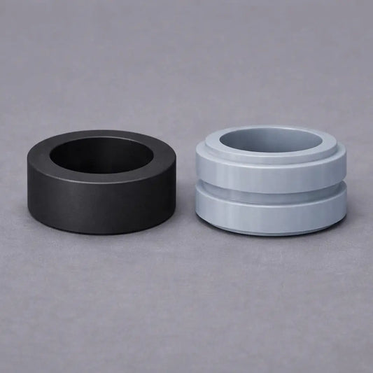 Bonded rubber-to-metal industrial bush with inner sleeve for vibration isolation, shock absorption and pivot support in heavy-duty machinery.
