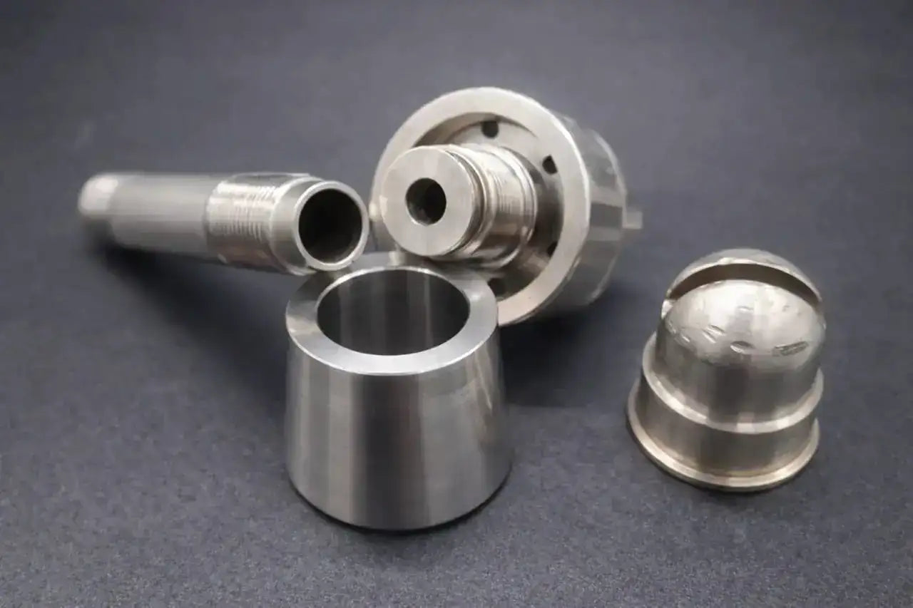 Precision-machined stainless steel spray nozzle fitting for industrial washdown and process systems