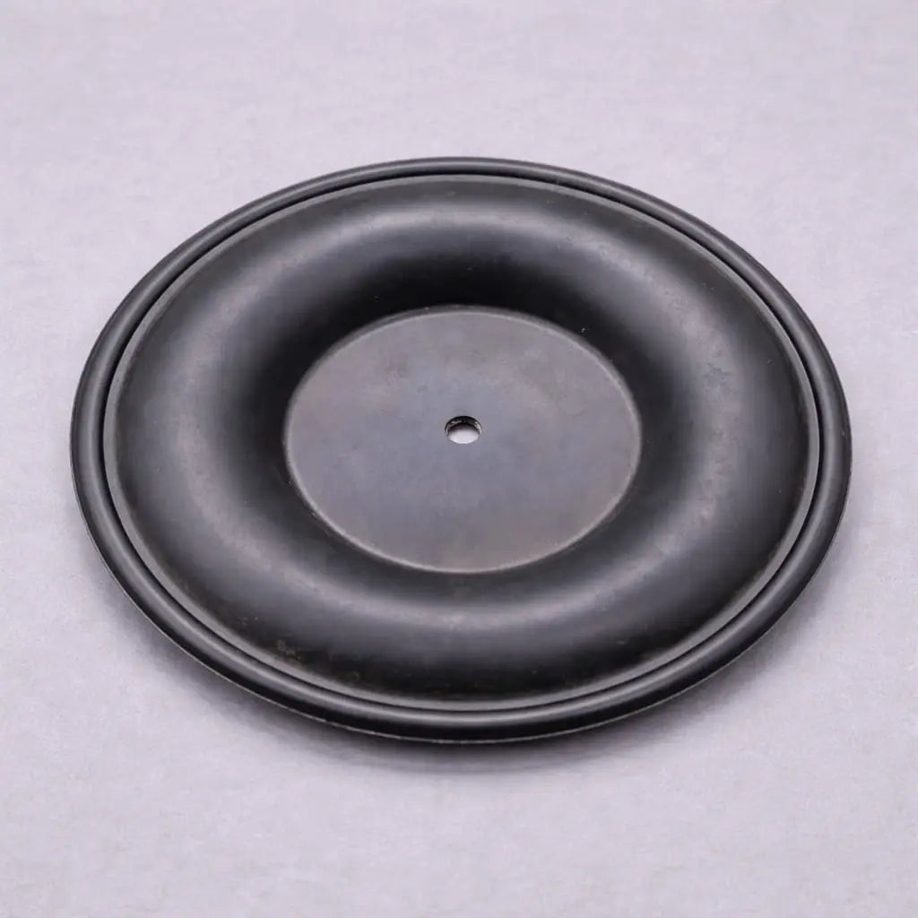 Industrial rubber and PTFE diaphragm with bolt holes and reinforced centre for pump and valve applications.